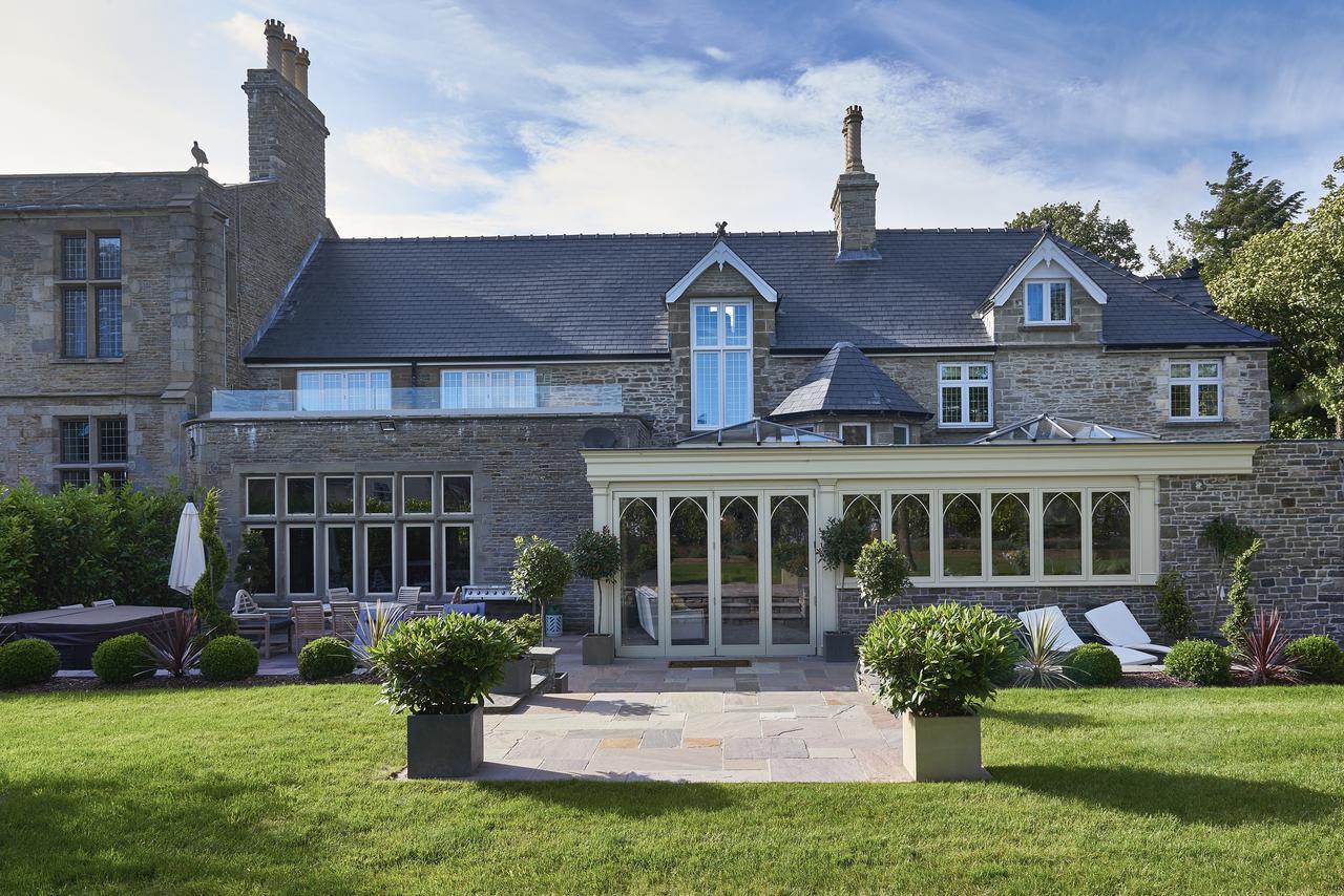 Lanelay Hall Hotel & Spa ヘンソル エクステリア 写真 The former station building at the rear of the house